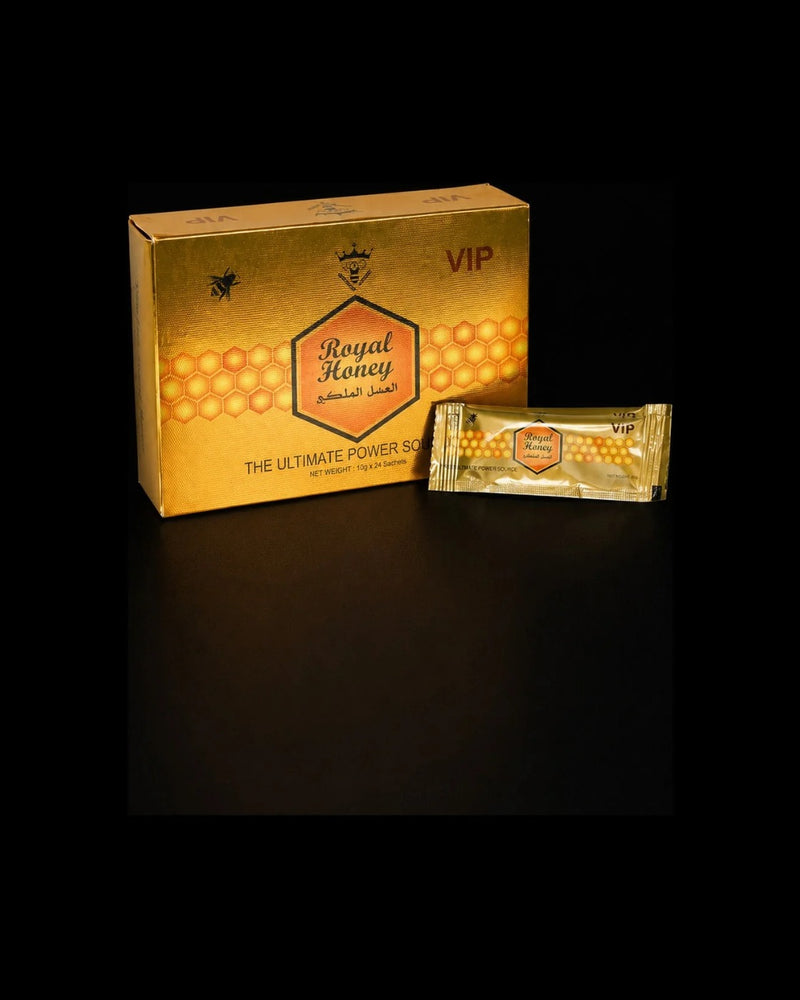 Royal Honey VIP gold presentation box with honeycomb detailing, shown beside a single gold sachet, normalized for consistent collection display.